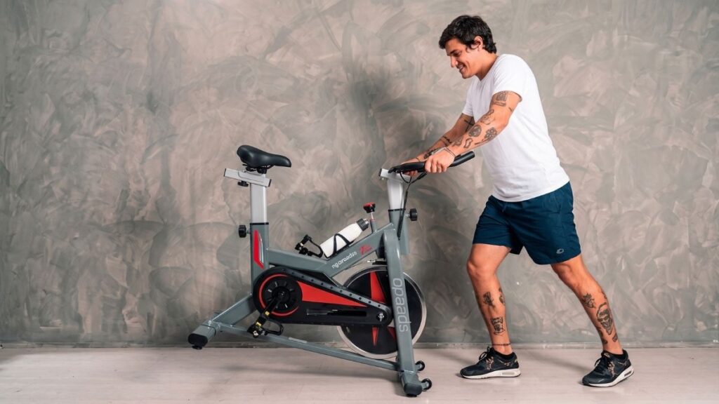 Base estabilizadora e rodinhas de transporte da bicicleta Speedo S103